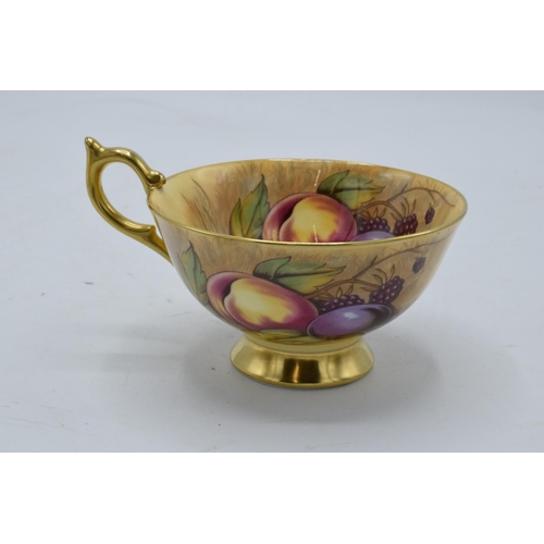 78 - Aynsley cup and saucer in the Orchard Gold design (2). Both pieces are signed by N. Brunt. In good c... 