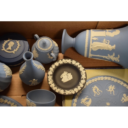 81 - A collection of Wedgwood Jasperware items in different colours such as blue, dark blue and black to ... 