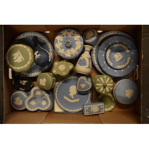 82 - A collection of Wedgwood Jasperware in various colours such as sage green, blue, black, white/grey t... 