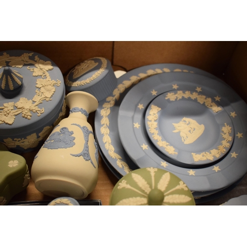 82 - A collection of Wedgwood Jasperware in various colours such as sage green, blue, black, white/grey t... 