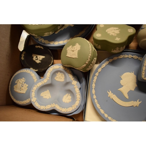 82 - A collection of Wedgwood Jasperware in various colours such as sage green, blue, black, white/grey t... 