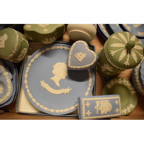 82 - A collection of Wedgwood Jasperware in various colours such as sage green, blue, black, white/grey t... 