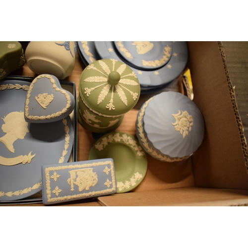 82 - A collection of Wedgwood Jasperware in various colours such as sage green, blue, black, white/grey t... 