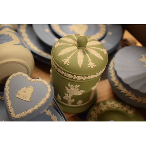 82 - A collection of Wedgwood Jasperware in various colours such as sage green, blue, black, white/grey t... 