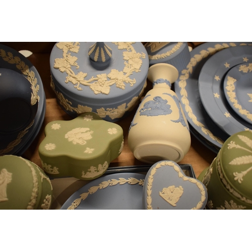 82 - A collection of Wedgwood Jasperware in various colours such as sage green, blue, black, white/grey t... 