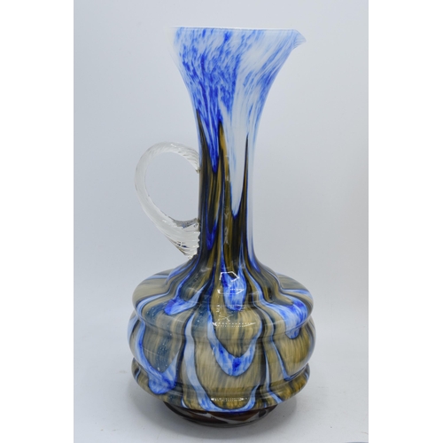 90 - A collection of assorted art / studio glass in the form of jugs, vases, a dish etc. Condition is gen... 