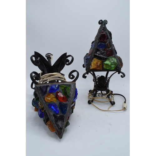 92 - A 1960s wrought iron and coloured glass table lamp together with a hanging lantern, believed to be m... 