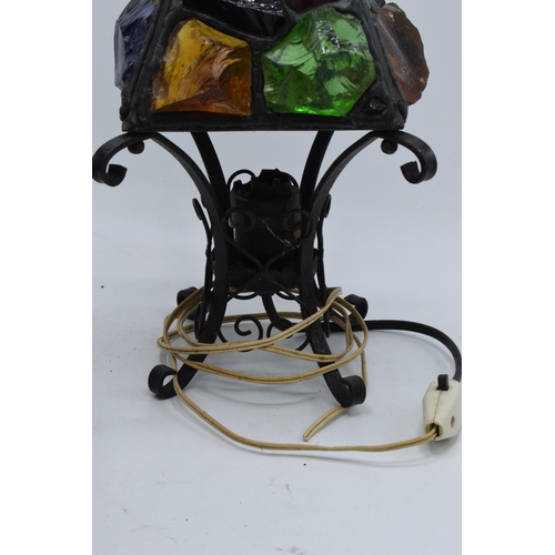 92 - A 1960s wrought iron and coloured glass table lamp together with a hanging lantern, believed to be m... 