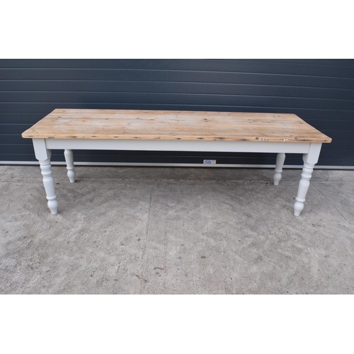 299 - A grand 8ft long 20th century pine topped farmhouse table sat on baluster legs. Painted with a vinta... 