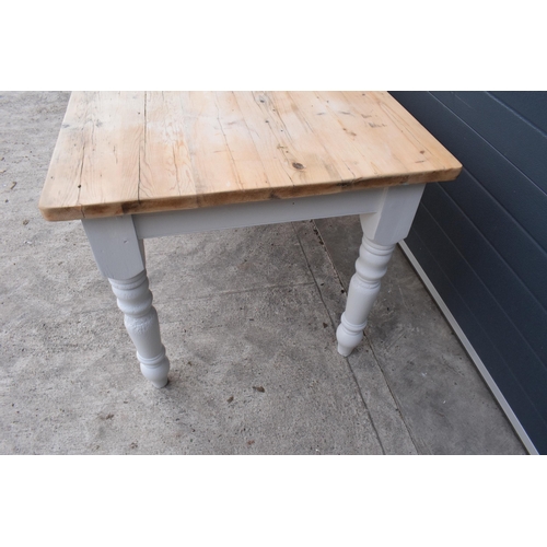 299 - A grand 8ft long 20th century pine topped farmhouse table sat on baluster legs. Painted with a vinta... 