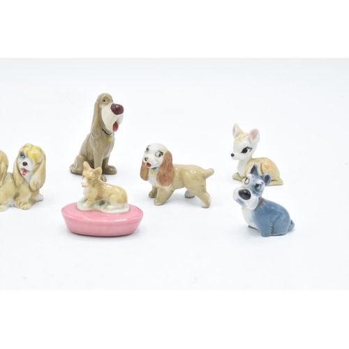 46 - A collection of Wade to include a corgi pen holder, dog with basket, 2 monkeys, Peg, Lady, Jock, Bam... 