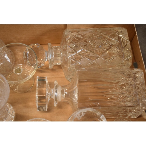 10J - A mixed collection of cut glass and crystal items to include 3 decanters, wine glasses, bowls etc. N... 