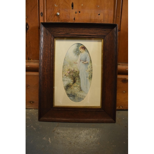 210A - An early 20th century print of a lady in robes admiring nature in an oak frame. 48 x 38cm.