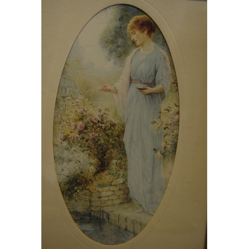 210A - An early 20th century print of a lady in robes admiring nature in an oak frame. 48 x 38cm.