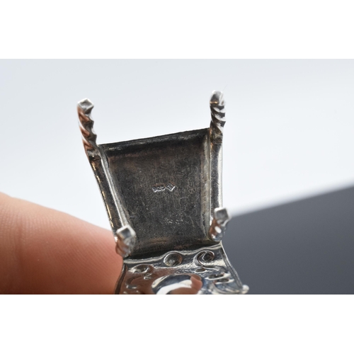 183 - Silver (925) miniature model of a hall chair. 10.8 grams. 5cm tall.
