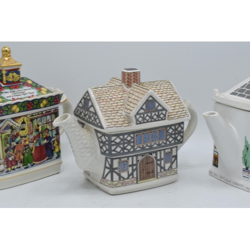 107 - A collection of Sadler Teapots to include Tudor House, A Christmas Carol and a Wade English Life tea... 