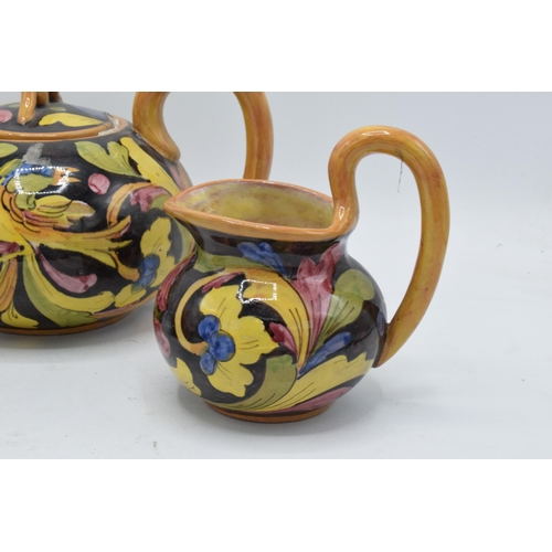 110 - An unusual tea set to consist of a teapot, milk jug and sugar bowl (3). Marked 'Mica 1272 Made Italy... 