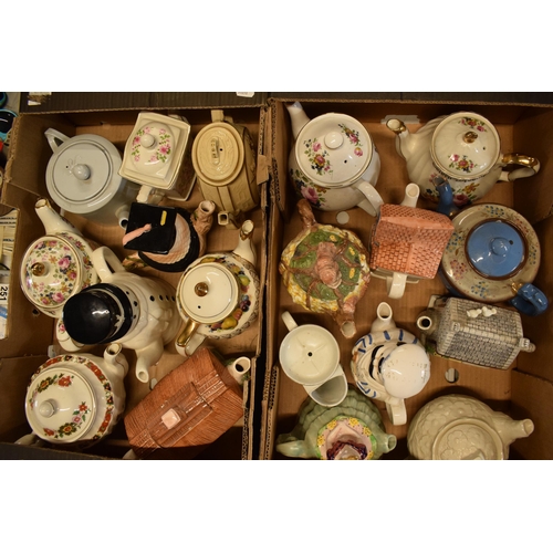 111 - A collection of teapots to include novelty examples, floral designs etc NO POSTAGE