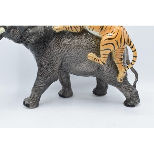 142 - Beswick Elephant and Tiger 1720. In good condition with no obvious damage or restoration. 29.5cm tal... 