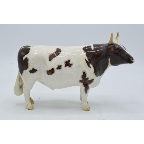 147 - Beswick Ayrshire Bull 1454B. In good condition with no obvious damage or restoration. With crazing a... 