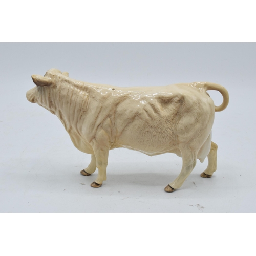 148 - Beswick Charolais Cow 3075A. In good condition with no obvious damage or restoration apart from a mi... 