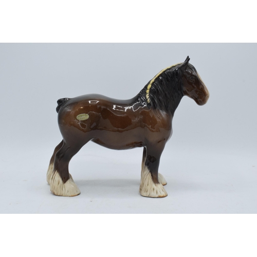 152 - Beswick brown shire 818 together with lying pony 915 (Doulton Backstamp) (2). In good condition with... 