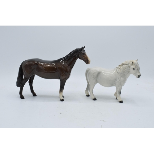 154 - Beswick Brown Huntsman's Horse 1484 together with Royal Doulton dapple grey Shetland pony (2). In go... 