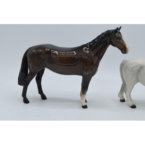 154 - Beswick Brown Huntsman's Horse 1484 together with Royal Doulton dapple grey Shetland pony (2). In go... 