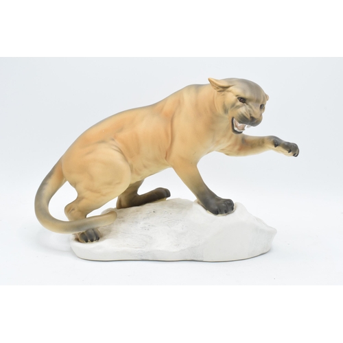 157 - Beswick matte Puma on Rock 1702. In good condition with no obvious damage or restoration. 21cm tall.