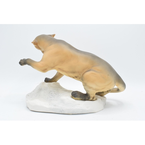 157 - Beswick matte Puma on Rock 1702. In good condition with no obvious damage or restoration. 21cm tall.