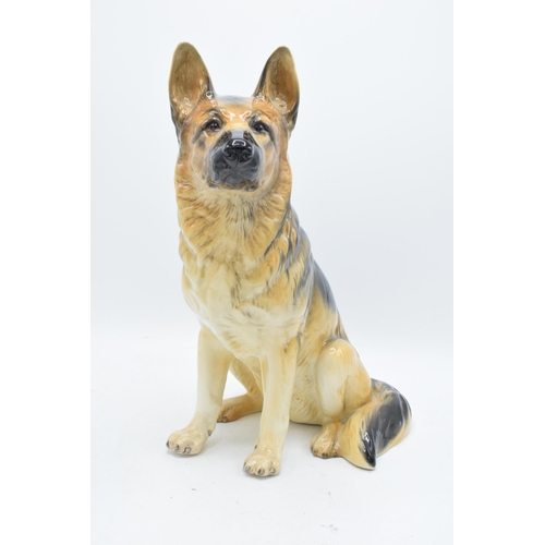 159 - Beswick Fireside Alsatian 2410. In good condition with no obvious damage or restoration. 35cm tall.