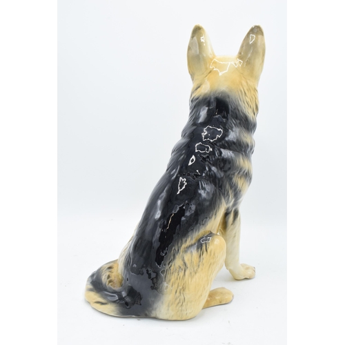 159 - Beswick Fireside Alsatian 2410. In good condition with no obvious damage or restoration. 35cm tall.