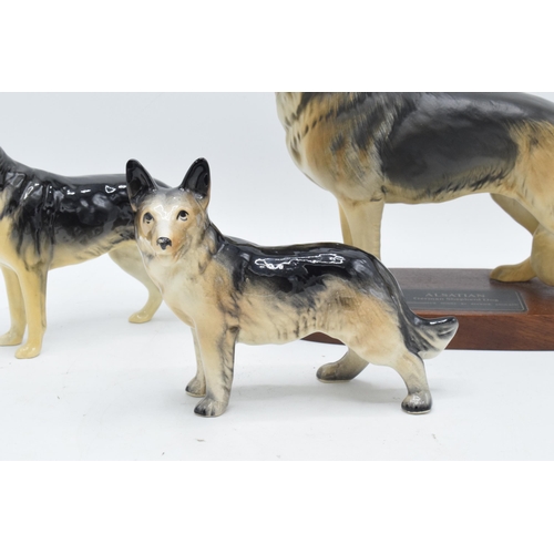 171 - A collection of Beswick to include a Connoisseur model of an Alsatian on base, Alsatian and another ... 