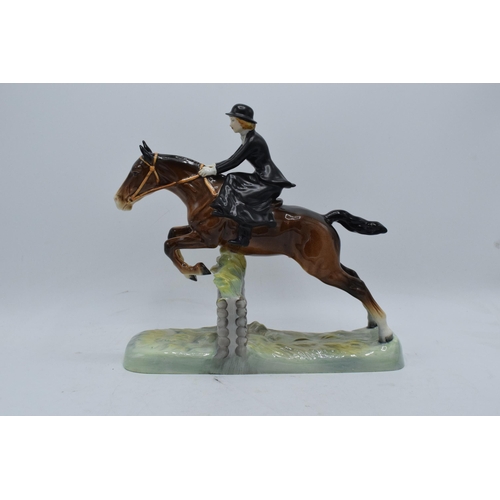 174 - Beswick Huntswoman 982. The piece appears to be in good condition however it has experienced restora... 