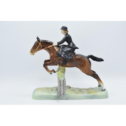 174 - Beswick Huntswoman 982. The piece appears to be in good condition however it has experienced restora... 