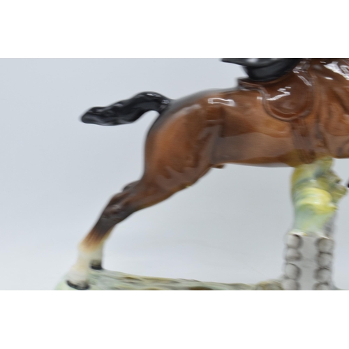 174 - Beswick Huntswoman 982. The piece appears to be in good condition however it has experienced restora... 