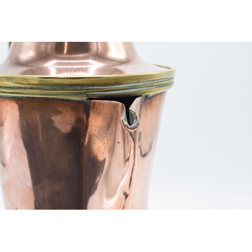 204 - A Henry Loveridge arts and crafts hammered copper spirit kettle on a stand together with a copper co... 