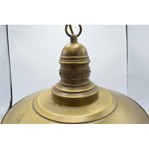 205 - A reproduction ceiling light in the style of a brass industrial lamp 'Queen of the West'. Untested. ... 