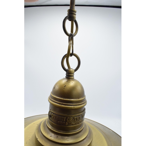 205 - A reproduction ceiling light in the style of a brass industrial lamp 'Queen of the West'. Untested. ... 