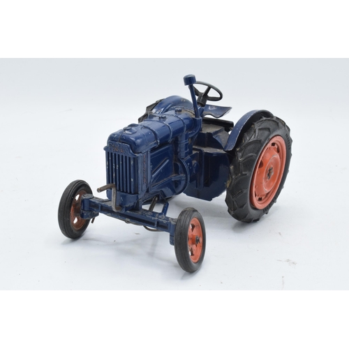 206 - Chad Valley diecast model of a Fordson Major tractor. In used condition though it is mostly present ... 