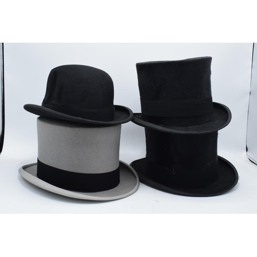 207 - A collection of top hats to include Hyam and Co of Birmingham, a Rowans example (grey with carry cas... 