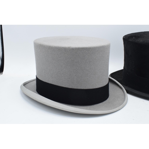 207 - A collection of top hats to include Hyam and Co of Birmingham, a Rowans example (grey with carry cas... 