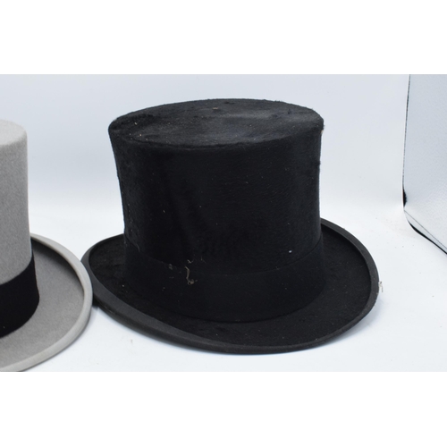 207 - A collection of top hats to include Hyam and Co of Birmingham, a Rowans example (grey with carry cas... 