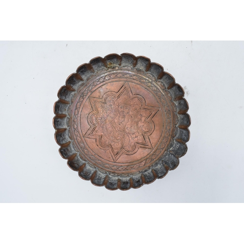 212 - 19th century Middle Eastern Islamic Persian copper tray with engravings depicting a man amongst foli... 