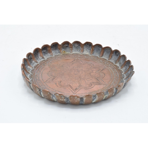 212 - 19th century Middle Eastern Islamic Persian copper tray with engravings depicting a man amongst foli... 