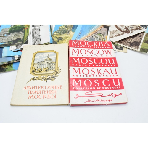 214 - A mixed collection of mainly 20th century postcards to include Russian interest, British scenes and ... 