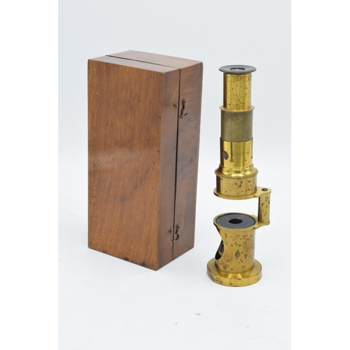 216 - A pair of items to include a late 19th / early 20th century drum microscope (14cm tall) in a fitted ... 