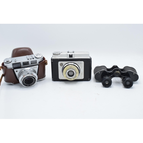 217 - A mixed collection of items to include Ilford Sporti camera, Kodak Prontormat camera, Miranda Panorm... 