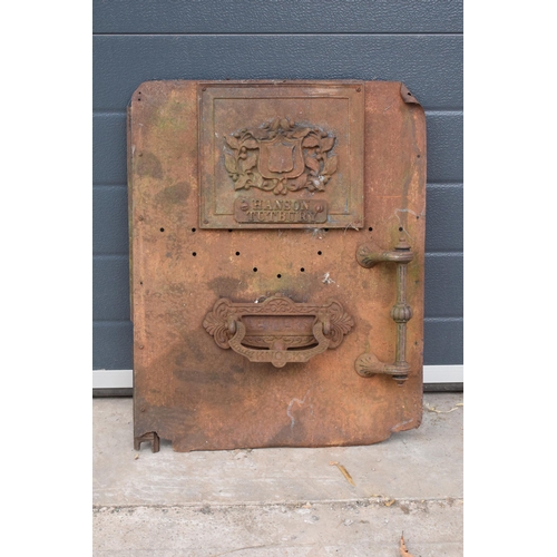 225 - An interesting late 19th century cast metal door (possibly for a furnace / oven) with 'Hanson Tutbur... 