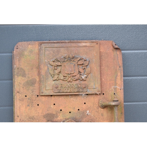 225 - An interesting late 19th century cast metal door (possibly for a furnace / oven) with 'Hanson Tutbur... 